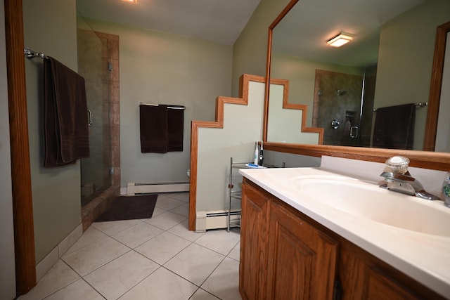 bathroom with a stall shower, a baseboard radiator, tile patterned flooring, and vanity