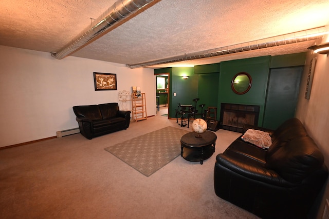 carpeted living room featuring a baseboard radiator, a fireplace, a textured ceiling, and baseboards