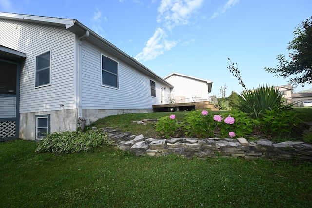 view of yard with a deck