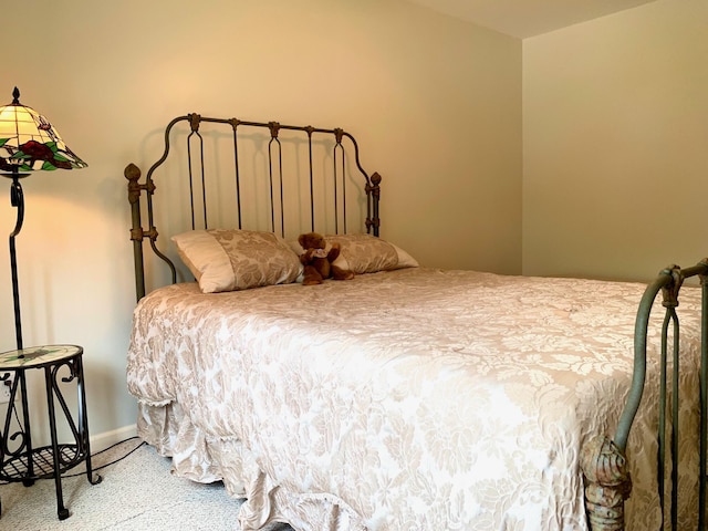 bedroom featuring baseboards