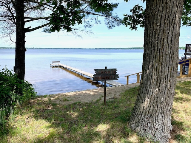 dock area featuring a water view