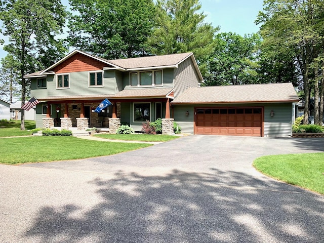 view of front of home with a garage, stone siding, aphalt driveway, and a front lawn