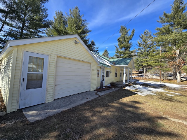 view of home's exterior with a garage