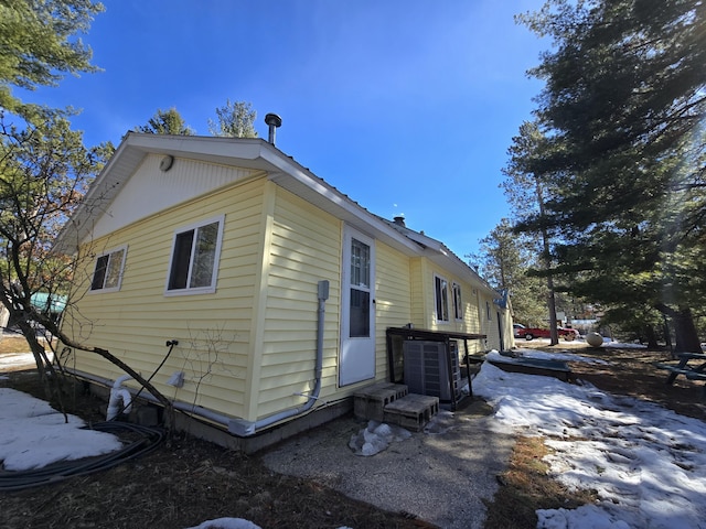 view of snow covered property