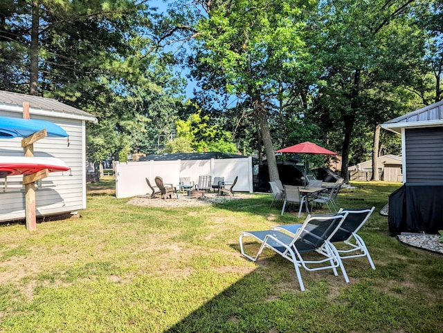 view of yard with fence