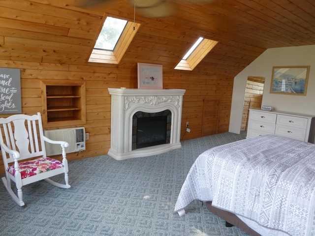 bedroom with vaulted ceiling with skylight, light carpet, wood walls, and wooden ceiling