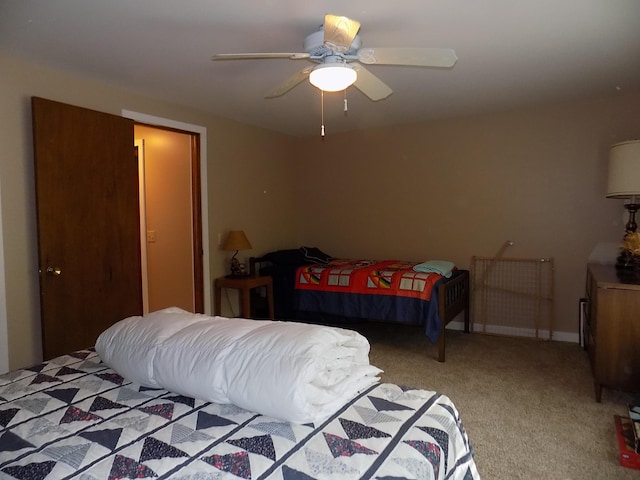 bedroom with light carpet and ceiling fan