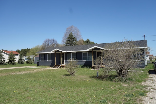 single story home with a front lawn