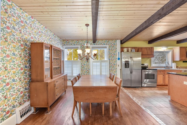 tiled dining room with an inviting chandelier, beamed ceiling, and wooden ceiling