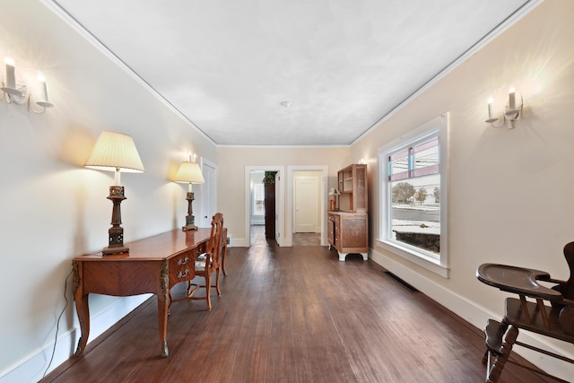 interior space with crown molding and dark hardwood / wood-style flooring