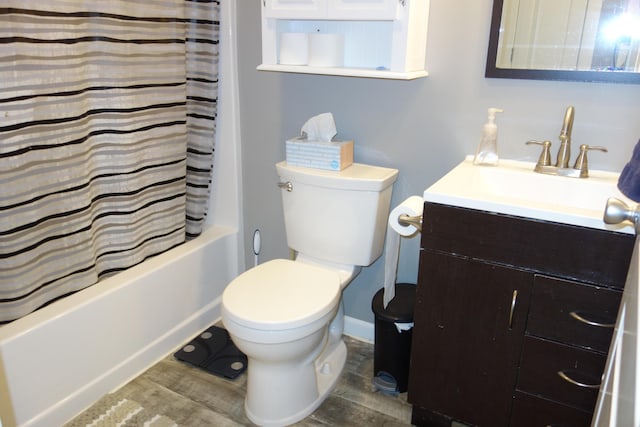 full bathroom featuring shower / bath combination with curtain, toilet, vanity, and hardwood / wood-style flooring