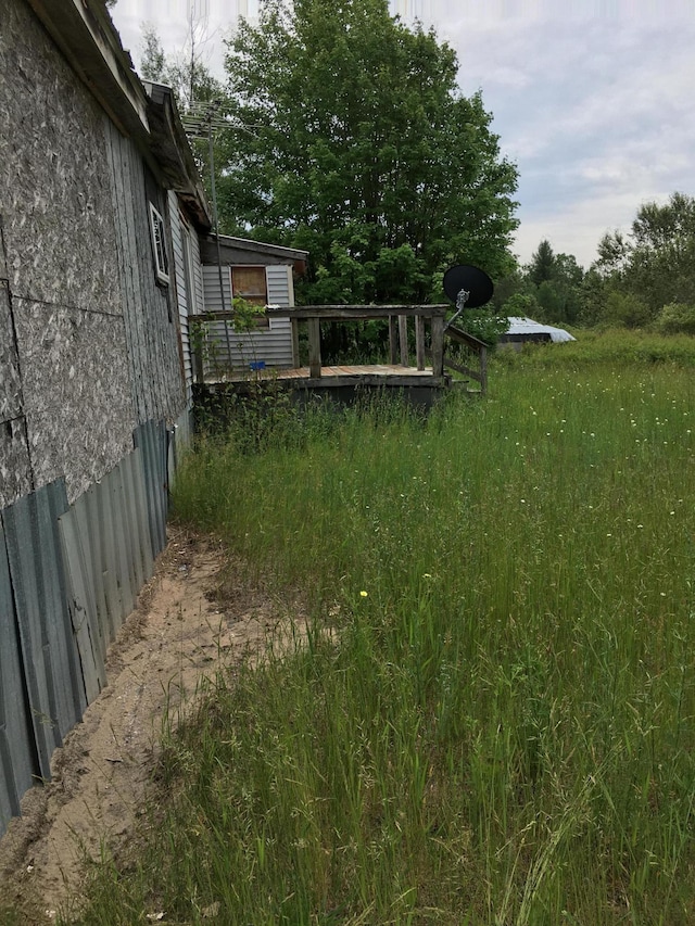 view of yard featuring a deck