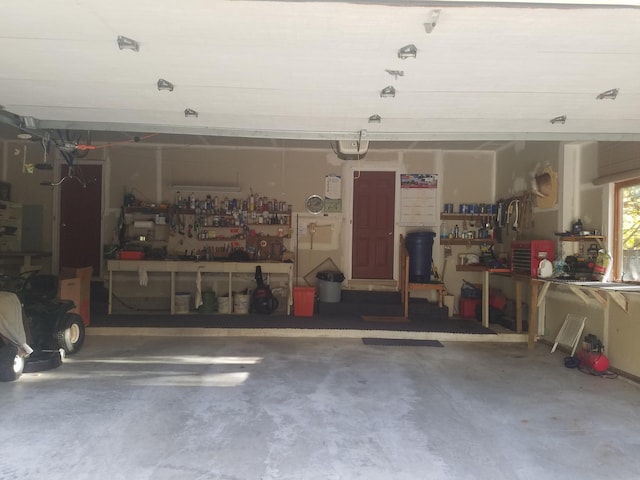 garage with a workshop area