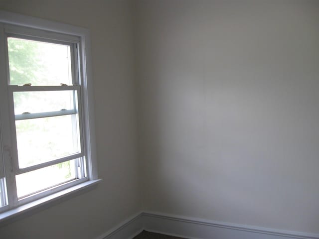 unfurnished room with plenty of natural light