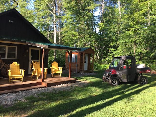 view of yard featuring a wooden deck