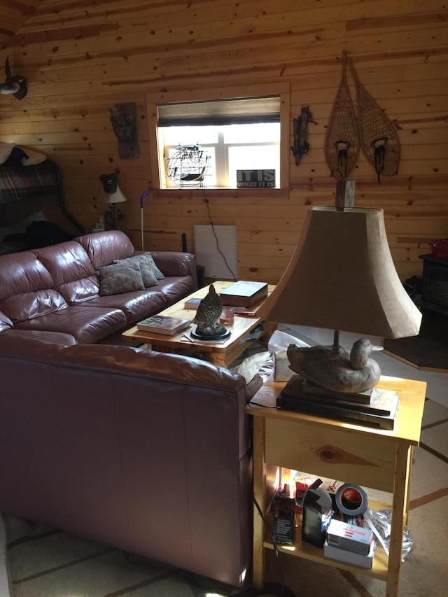 living room featuring wood walls