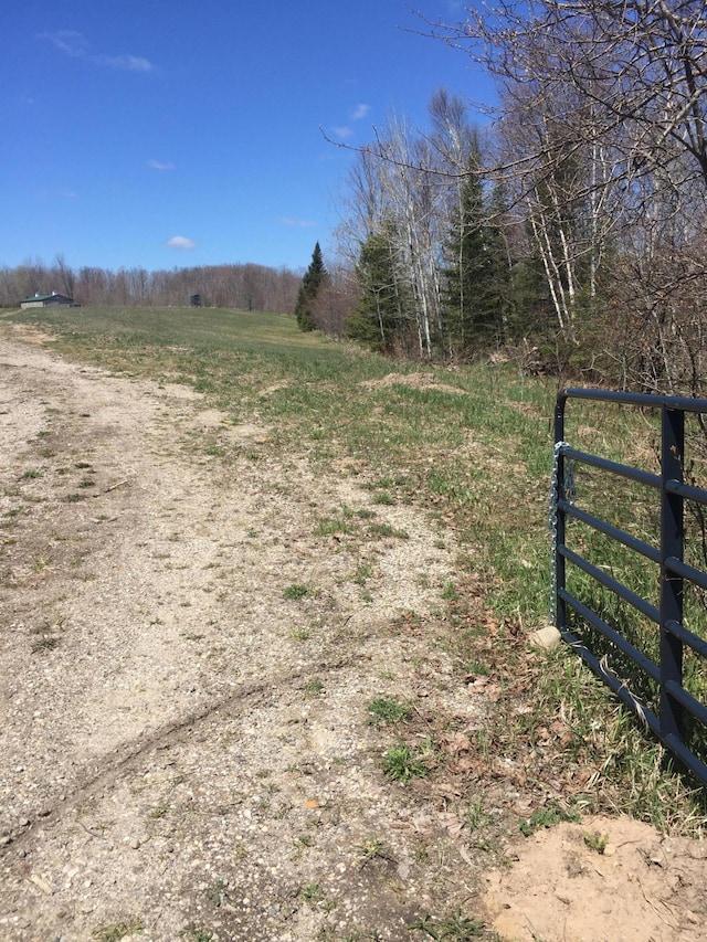 exterior space with a rural view