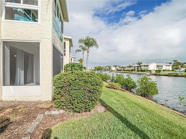 view of yard with a water view