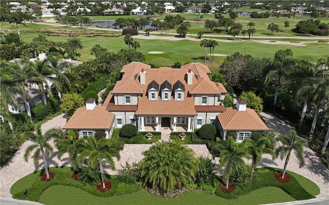 aerial view with a water view and golf course view