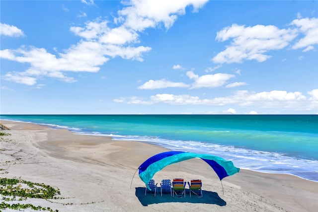 view of water feature with a beach view