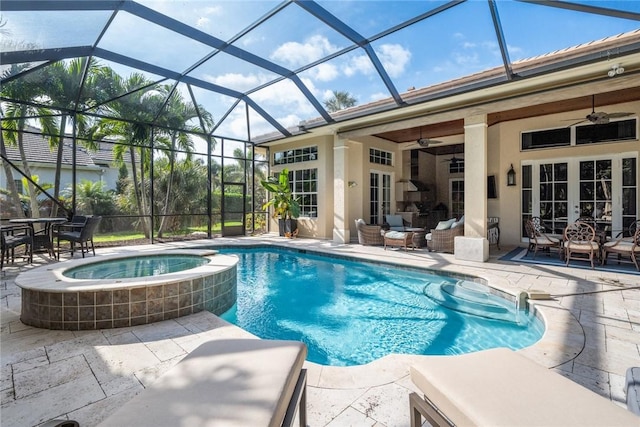 view of pool with a patio, an in ground hot tub, ceiling fan, glass enclosure, and french doors