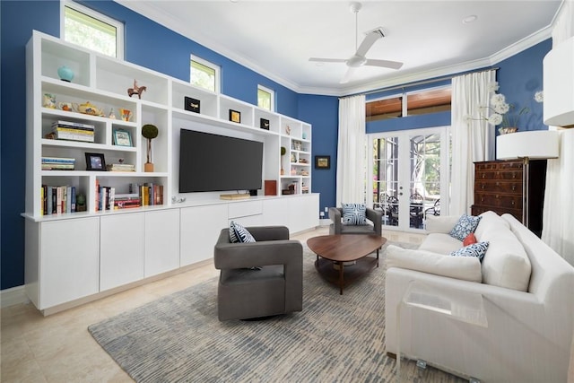 living room featuring crown molding, french doors, and ceiling fan