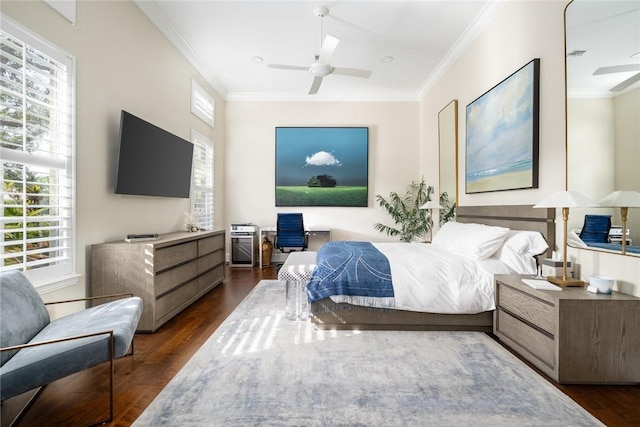 bedroom featuring ornamental molding, dark hardwood / wood-style floors, and ceiling fan