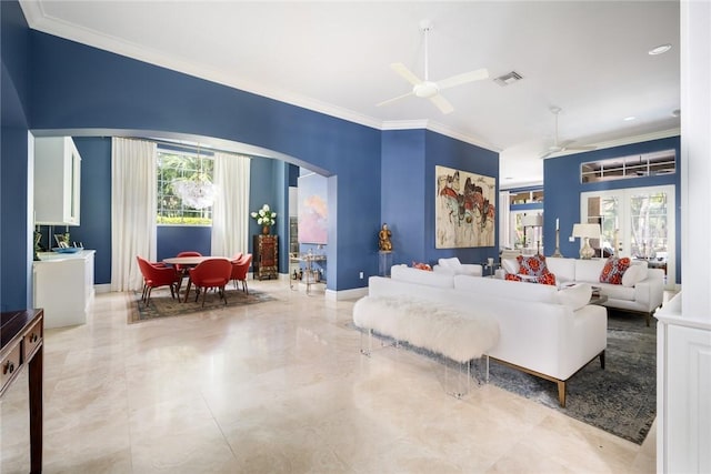 living room featuring crown molding, ceiling fan, and french doors