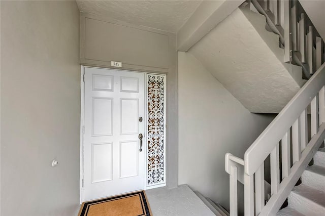 1875 Bay Rd Unit 215H, Vero Beach, FL 32963 - doorway to property featuring stucco siding