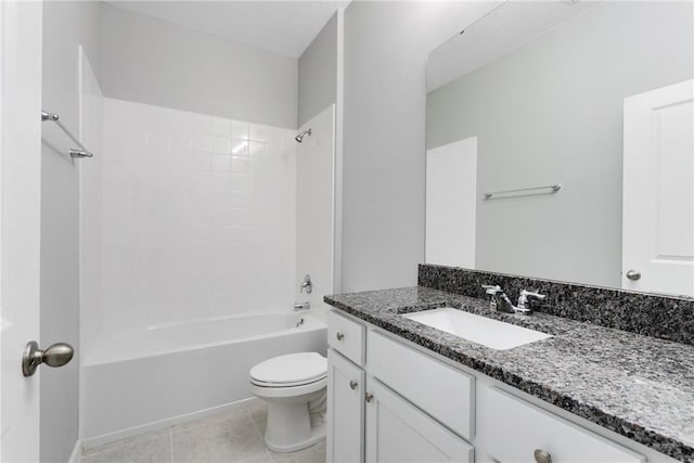 426 Douglas Ct, Fort Pierce, FL 34950 - bathroom featuring washtub / shower combination, tile patterned flooring, vanity, and toilet
