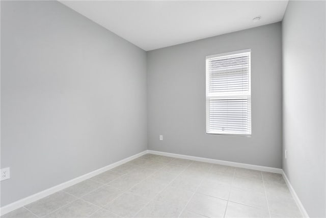 426 Douglas Ct, Fort Pierce, FL 34950 - unfurnished room with light tile patterned floors and baseboards