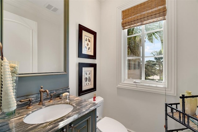 1507 Ocean Dr Unit 5, Vero Beach, FL 32963 - bathroom with toilet and vanity