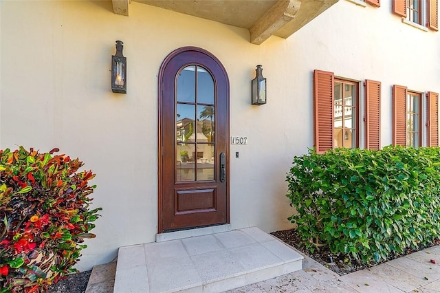 1507 Ocean Dr Unit 5, Vero Beach, FL 32963 - doorway to property with stucco siding