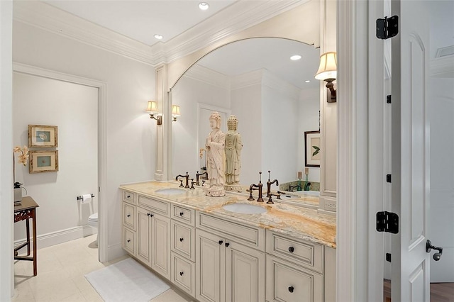 1507 Ocean Dr Unit 5, Vero Beach, FL 32963 - full bath featuring toilet, double vanity, ornamental molding, and recessed lighting