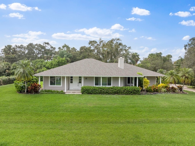 single story home featuring a front yard