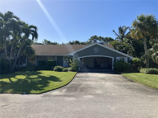 ranch-style home with a front lawn