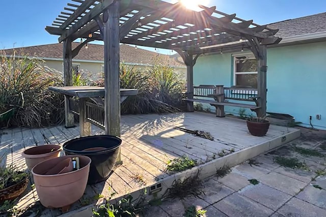 wooden terrace with a pergola