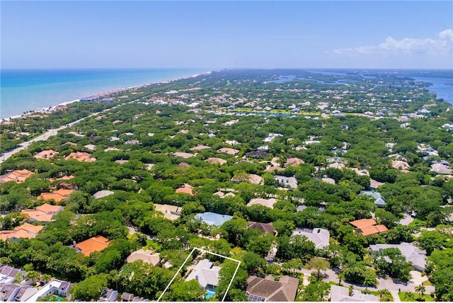 birds eye view of property featuring a water view and a residential view