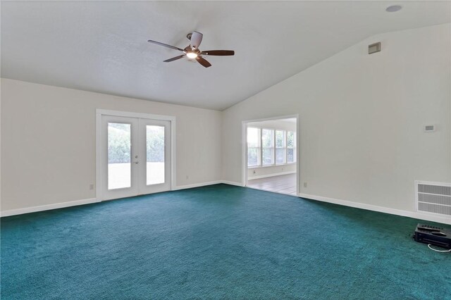2225 86th Dr, Vero Beach, FL 32966 - carpeted empty room with ceiling fan, lofted ceiling, french doors, and baseboards