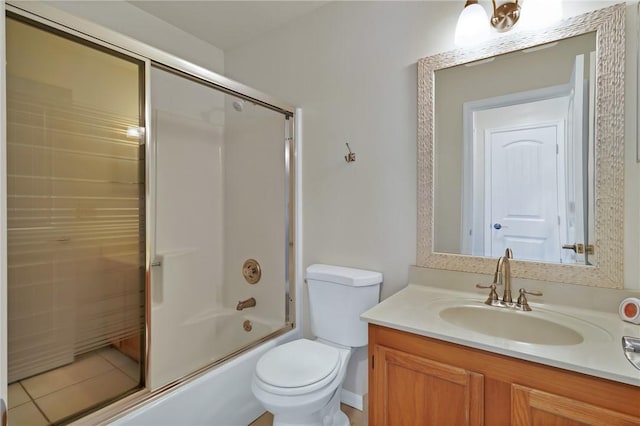 2225 86th Dr, Vero Beach, FL 32966 - bathroom with toilet, vanity, and shower / bath combination with glass door