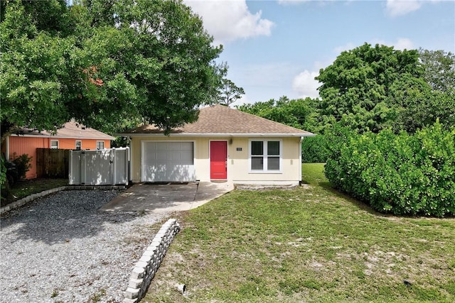 2225 86th Dr, Vero Beach, FL 32966 - view of front of home featuring concrete driveway and a garage
