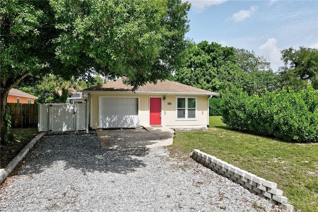 2225 86th Dr, Vero Beach, FL 32966 - view of front of property with driveway and a gate
