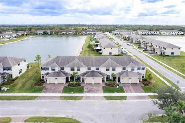 bird's eye view with a water view