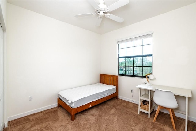 bedroom featuring ceiling fan and carpet flooring