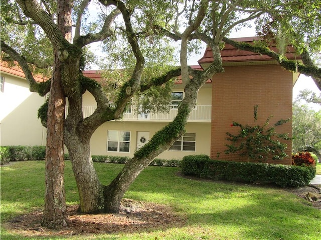 exterior space with a lawn