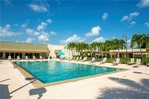 view of swimming pool featuring a patio