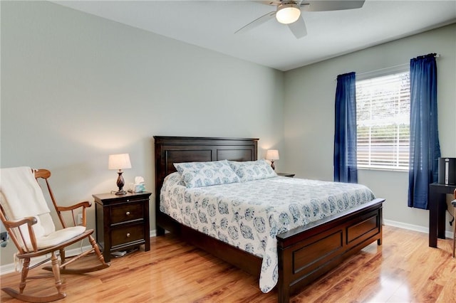 6375 Oxford Cir Unit 104D, Vero Beach, FL 32966 - bedroom featuring baseboards, ceiling fan, and light wood-style floors