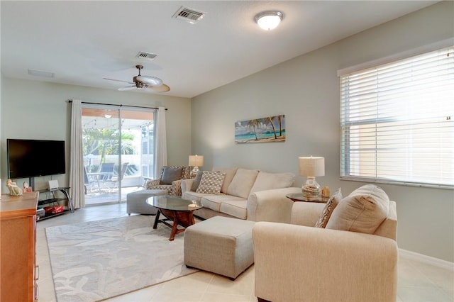 6375 Oxford Cir Unit 104D, Vero Beach, FL 32966 - living area featuring visible vents, light tile patterned floors, and ceiling fan