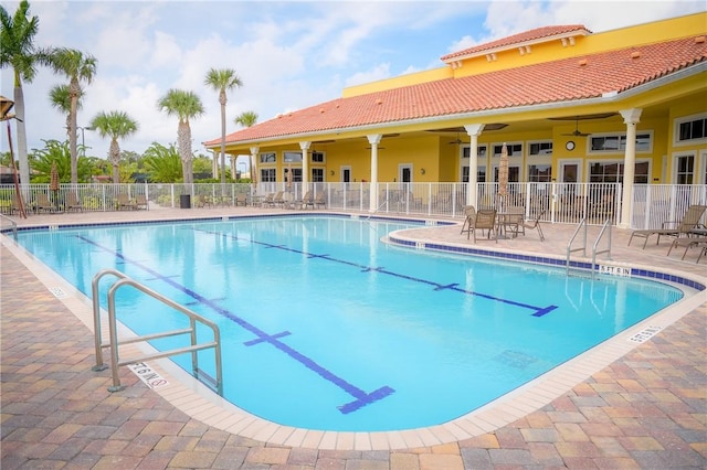6375 Oxford Cir Unit 104D, Vero Beach, FL 32966 - community pool with a ceiling fan, a patio area, and fence