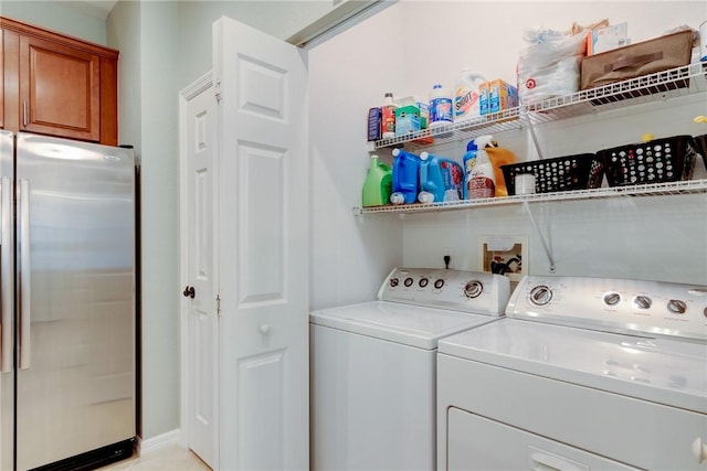 6375 Oxford Cir Unit 104D, Vero Beach, FL 32966 - clothes washing area featuring laundry area and washing machine and dryer